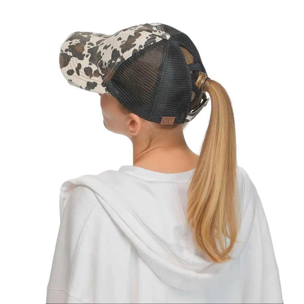 C.C Distressed Cow Print Criss-Cross Ponytail Baseball Cap