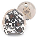 C.C Distressed Cow Print Criss-Cross Ponytail Baseball Cap