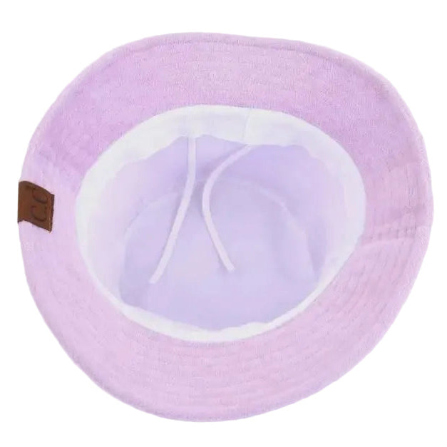 A light purple bucket hat shown from a top-down view, featuring a white inner lining and a small brown leather brand patch on the side.