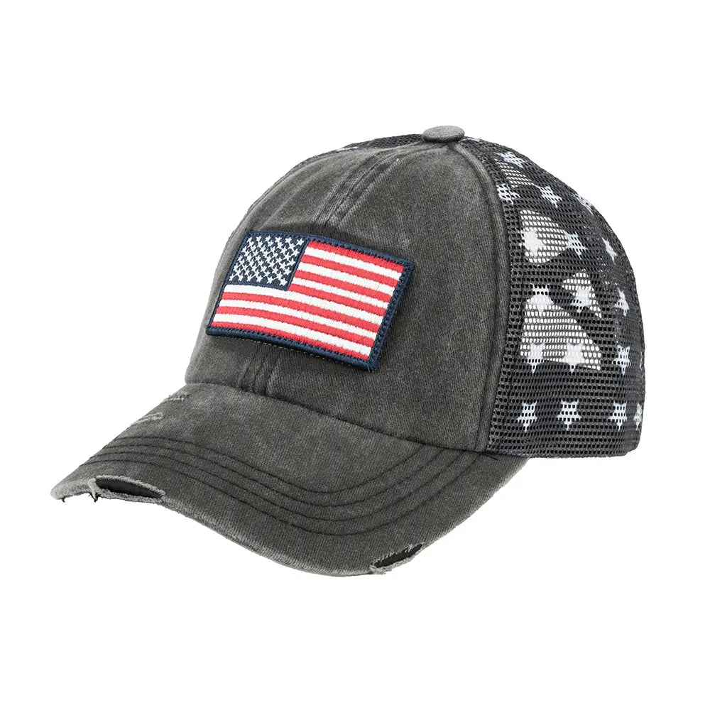Black baseball cap with American flag patch on a white background