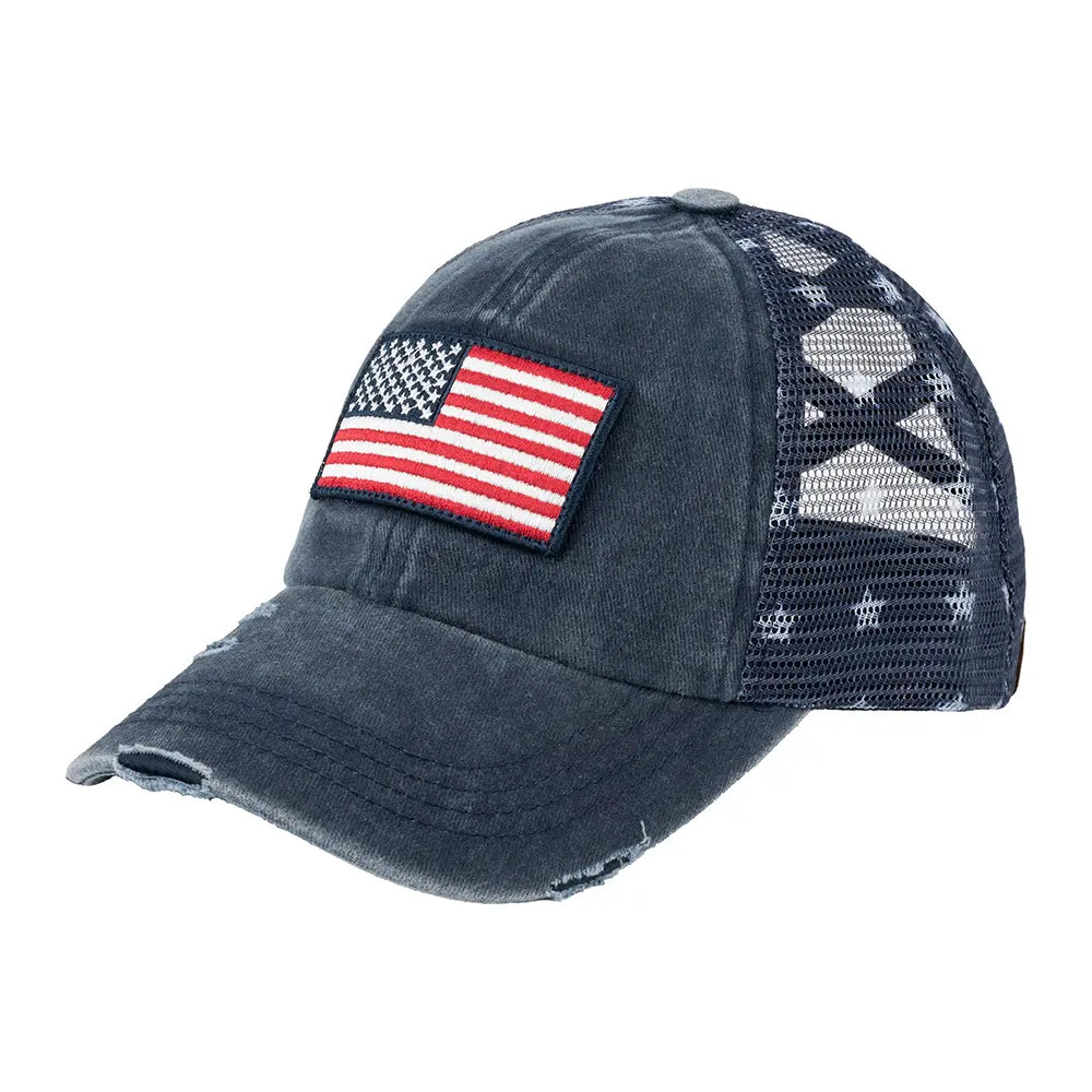 Navy blue trucker cap with American flag patch on a white background