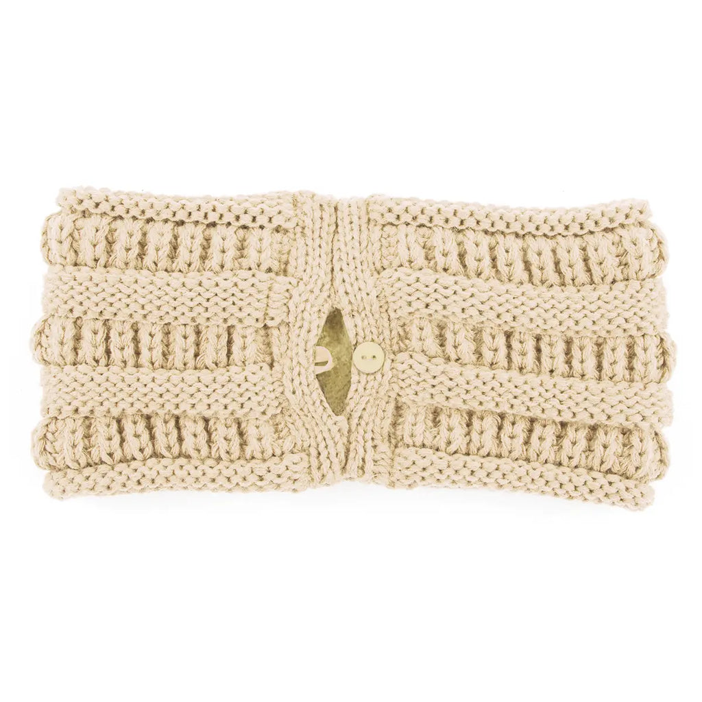 A beige chunky knit ear warmer with a central button closure, shown flat against a white background.