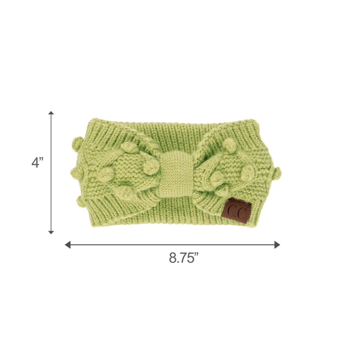 A light green knitted headband with a large central bow and pom-pom details, shown on a white background with dimension arrows indicating 4 inches in height and 8.75 inches in width.