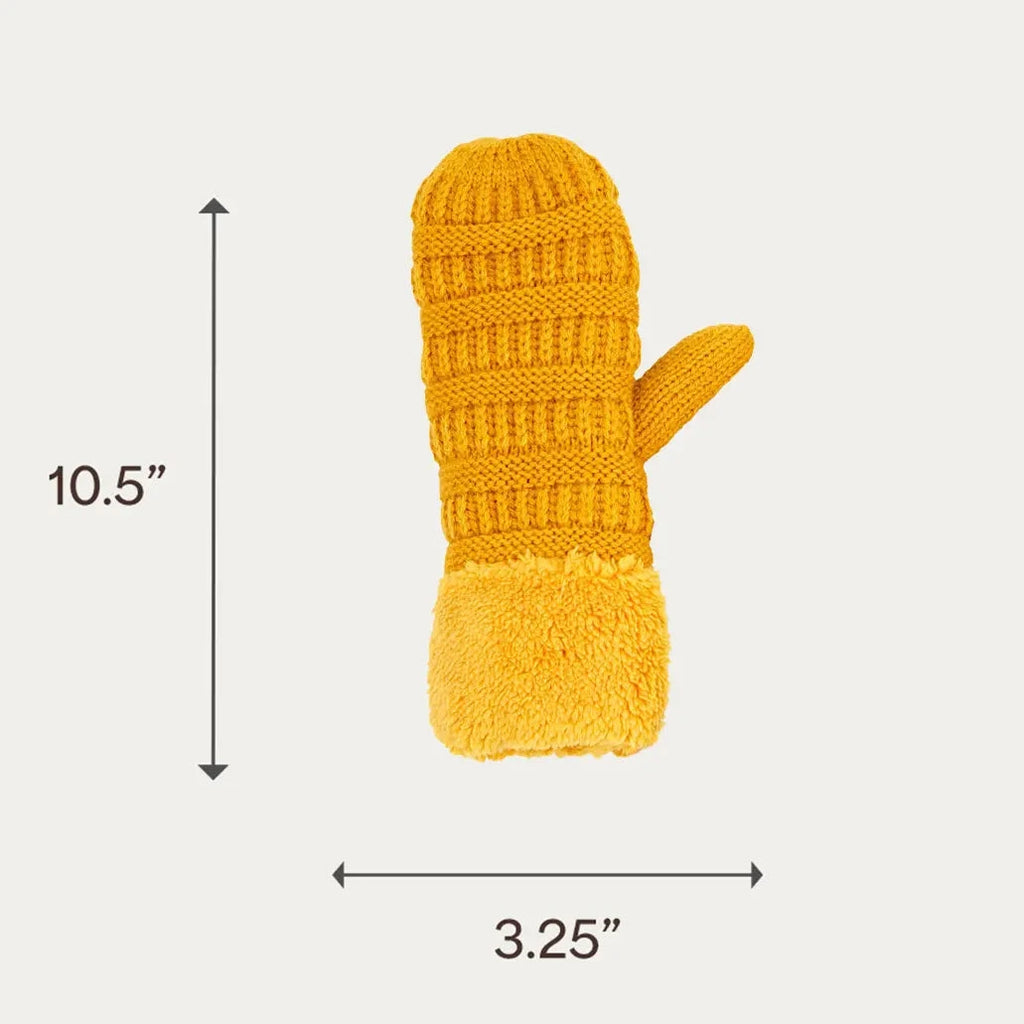 A single mustard yellow knit mitten with a fuzzy cuff, shown on a light gray background with dimension arrows and text.